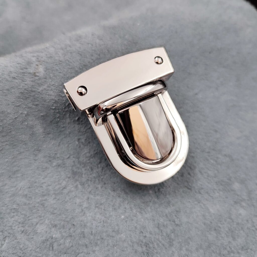 Nickel Tuck Lock