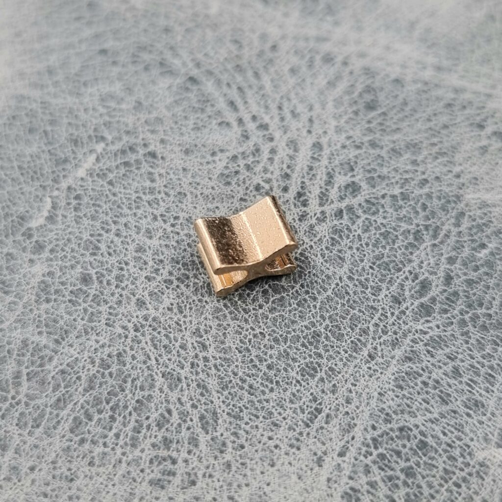 6.38mm x 2.2mm Gilt Clamp/ Zip Stopper ( Pack of 10) - Image 2